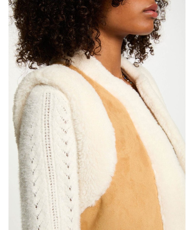 Chaleco recto sin mangas...